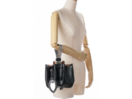 ALAÏA Calfskin Eyelet Bracelet Embellished Bucket Bag Black Online